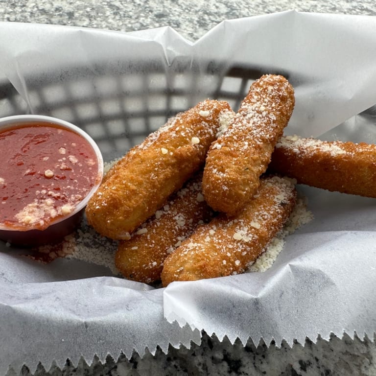 Golden Mozzarella Sticks: A Sports Bar Favorite